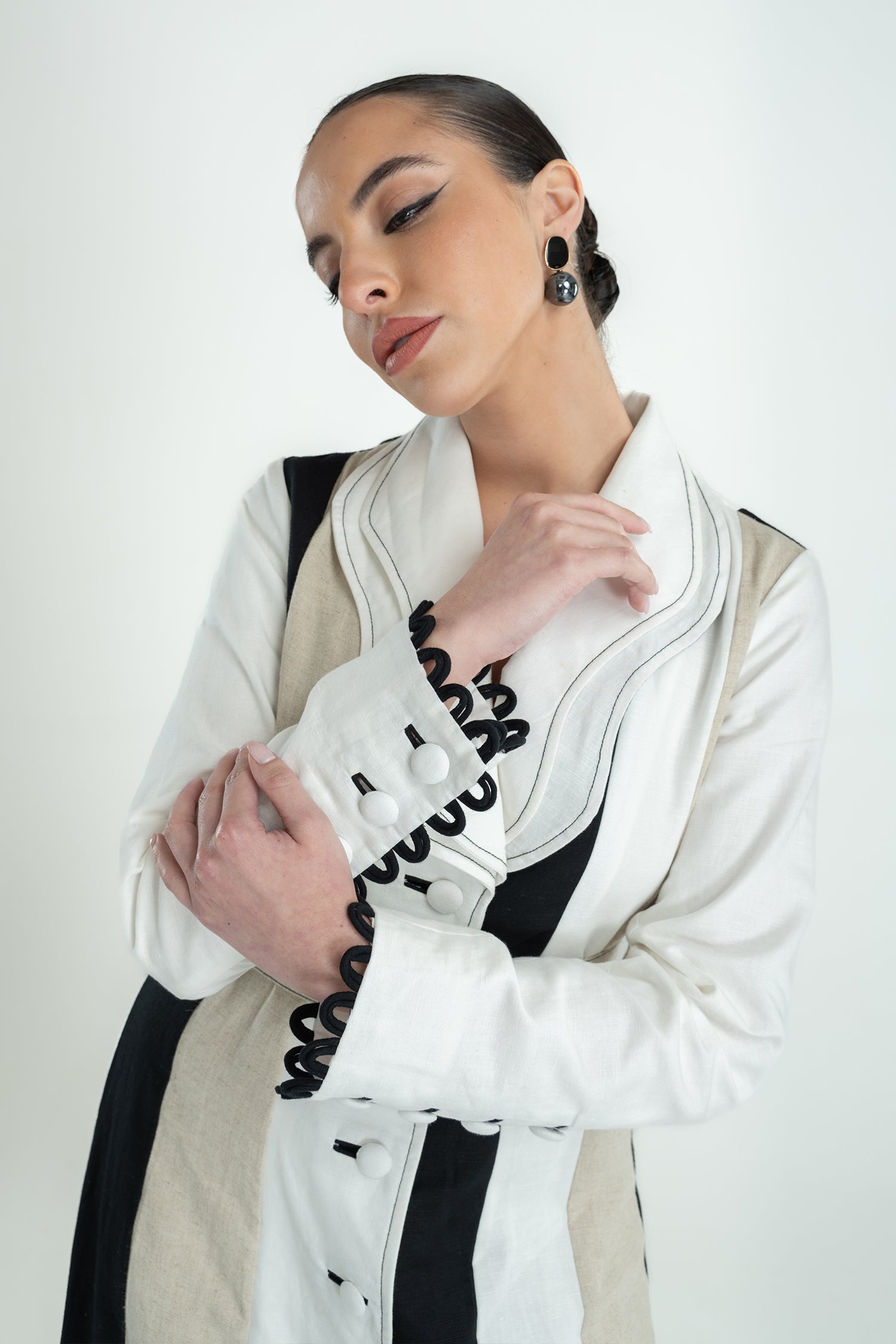 RIRI BELTED LONG TRENCH