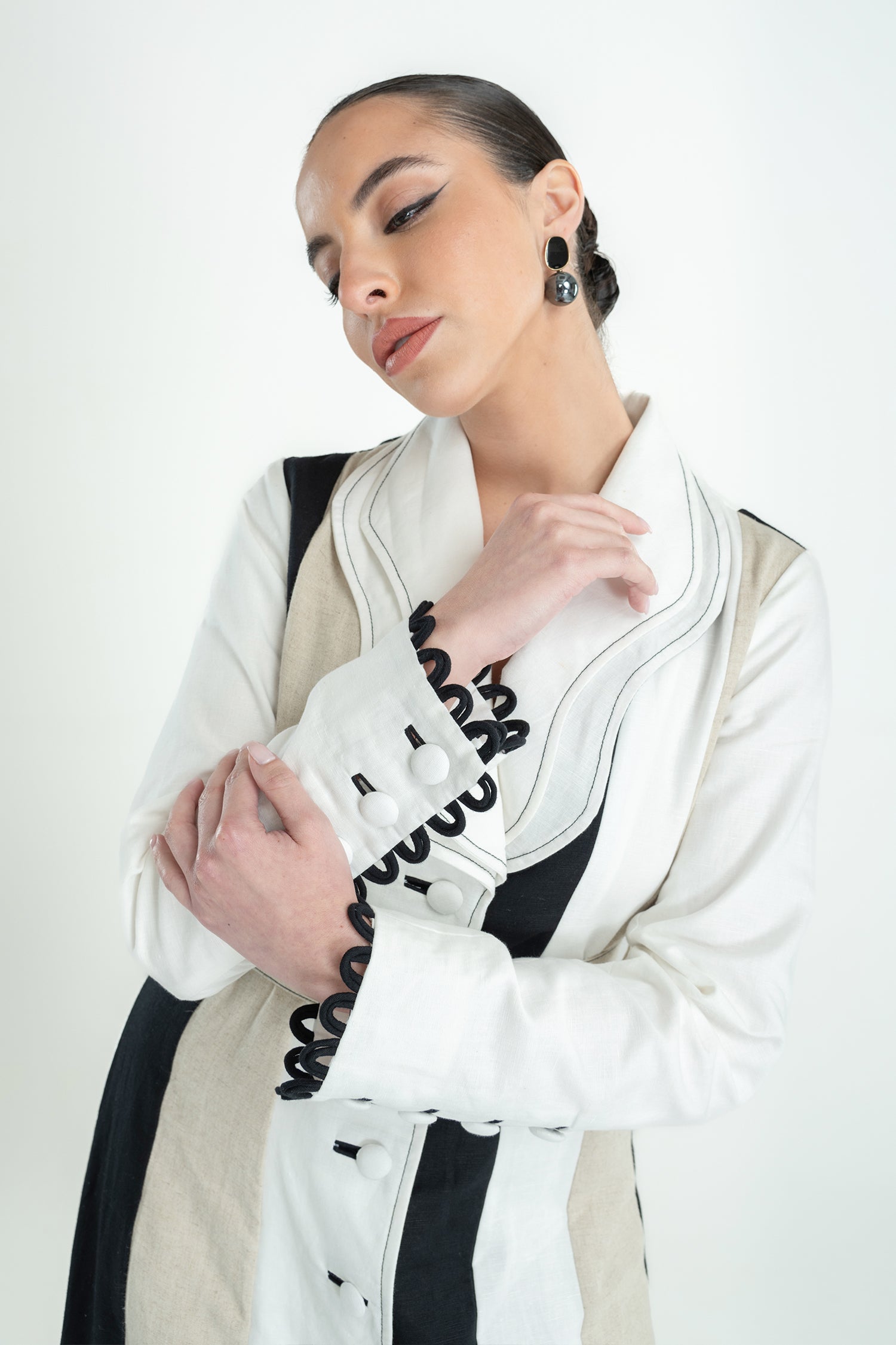 RIRI BELTED LONG TRENCH